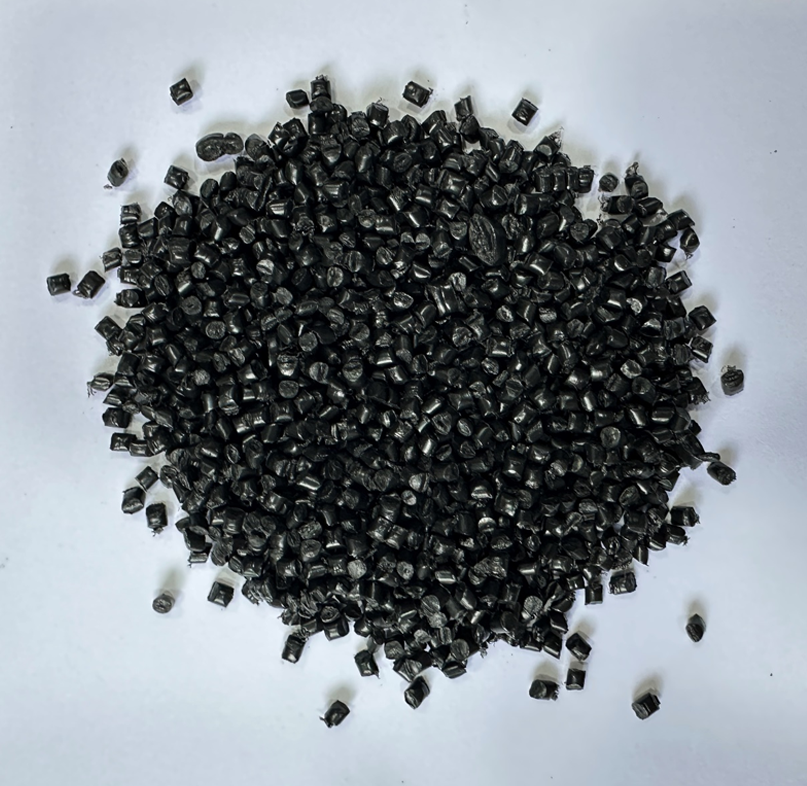 PPCP BLACK NEXT TO VIRGIN PLASTIC GRANULES